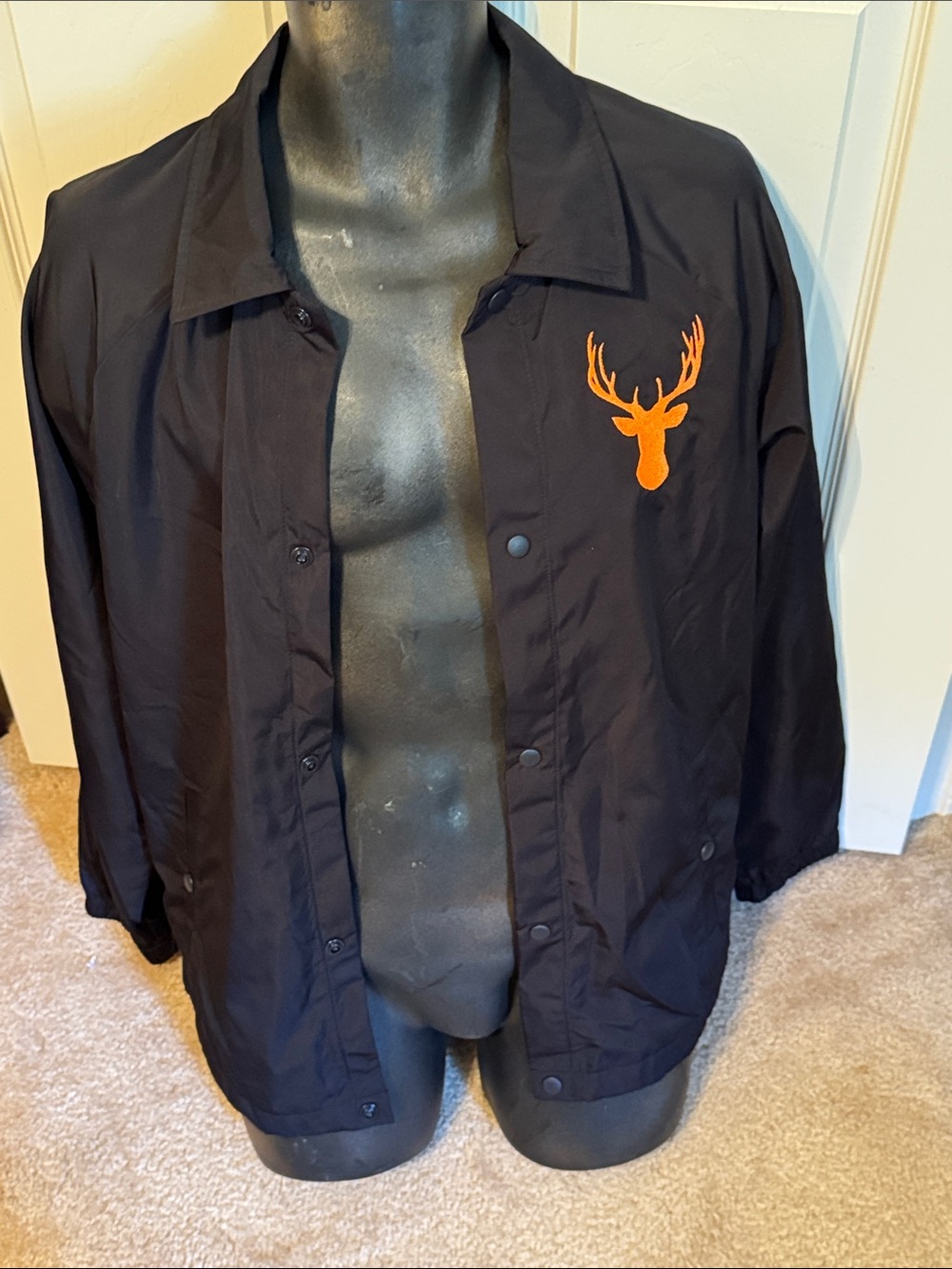No Boundaries Kings of New York Men's Black Coach Jacket with Orange Deer Logo.